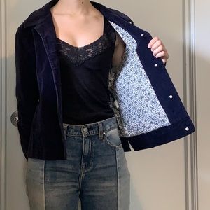 Vintage navy button-up corduroy jacket with cute flowery inside lining.